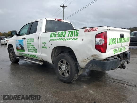 2014 Toyota Tundra SR with VIN 5TFRM5F16EX068715, listed as a Copart auction lot 90614305 with 312,428 mi miles and Clean title. Bid and sale history available at DreamBid. Image 2.