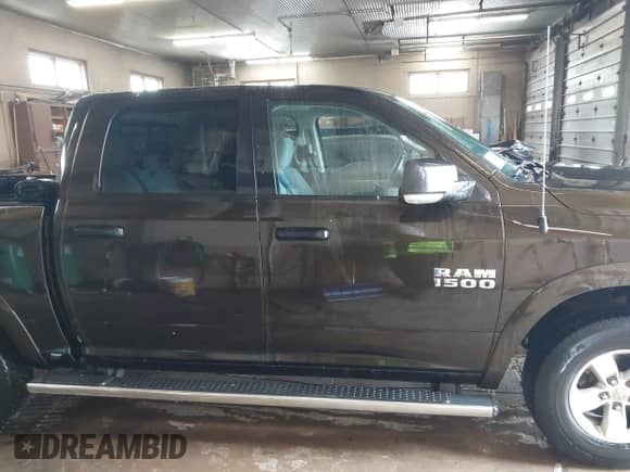 2014 Ram 1500 Big Horn z VIN 1C6RR7LG0ES250145, wystawiony jako IAAI lot #42243822 z przebiegiem 159 893 mil mil oraz . Historia ofert i sprzedaży dostępna na DreamBid. Obrazek 12.