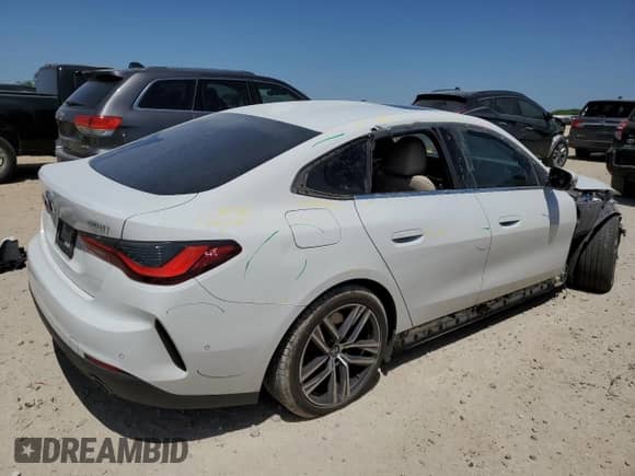 2024 BMW 4 Series 430i с VIN WBA63AV09RFR61736, выставлен на аукционе Copart как лот 52798015 с пробегом 45 705 миль миль и Списание • Salvage title. История ставок и продаж доступна на DreamBid. Изображение 3.