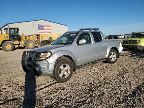 2006 Nissan Frontier LE with VIN 1N6AD07U66C416785, listed as a Copart auction lot 82629405 with 174,566 mi miles and Salvage title. Bid and sale history available at DreamBid. Image 1.