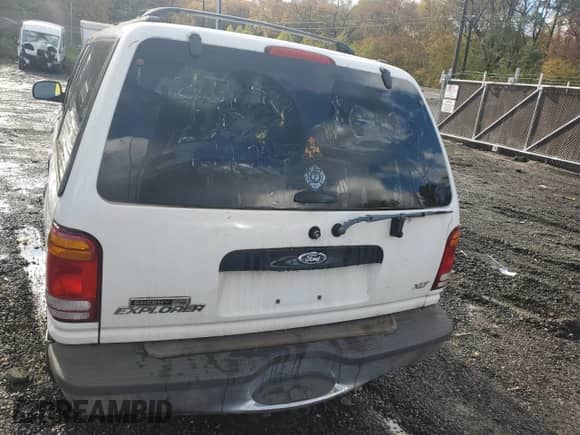 1998 Ford Explorer XLT with VIN 1FMZU35P6WZB60144, listed as a Copart auction lot 90896645 with Not provided miles and Salvage title. Bid and sale history available at DreamBid. Image 6.