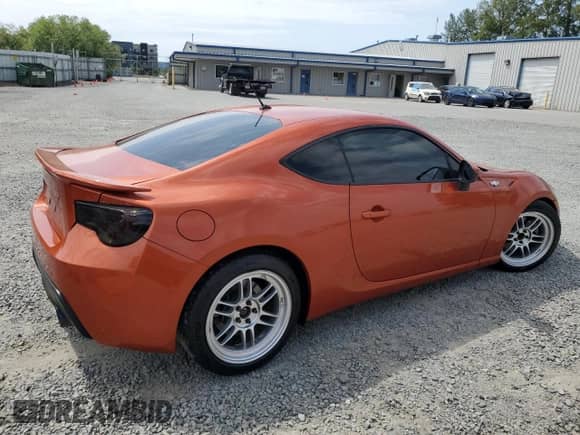 2014 Scion FR-S z VIN JF1ZNAA19E9701666, wystawiony jako Copart lot #61102965 z przebiegiem 115 081 mil mil oraz Nie do naprawy • Non repairable. Historia ofert i sprzedaży dostępna na DreamBid. Obrazek 3.