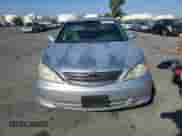 2002 Toyota Camry LE with VIN 4T1BE32K42U552229, listed as a Copart auction lot 84379825 with 258,234 mi miles and Salvage title. Bid and sale history available at DreamBid. Image 5.