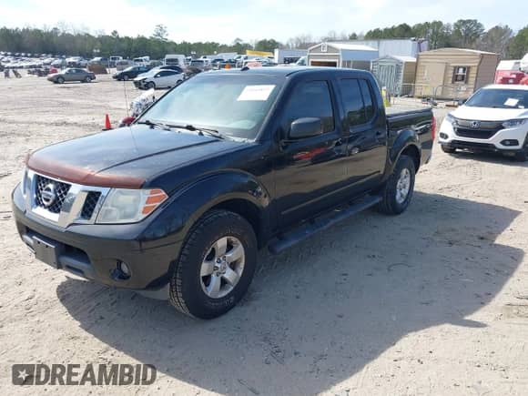 2013 Nissan Frontier SV with VIN 1N6AD0ER2DN730871, listed as a IAAI auction lot 41843827 with 124,712 mi miles and . Bid and sale history available at DreamBid. Image 17.