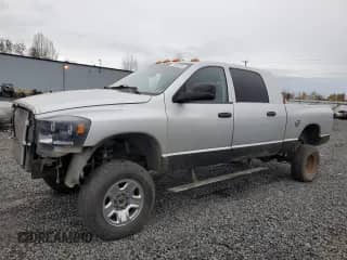 2006 Dodge 3500 Laramie with VIN 3D7LX39C66G149790, listed as a Copart auction lot 79558594 with 147,389 mi miles and Salvage title. Bid and sale history available at DreamBid. Image 1.
