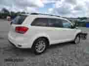 2013 Dodge Journey SXT with VIN 3C4PDCBB9DT587505, listed as a Copart auction lot 82212735 with 221,413 mi miles and Salvage title. Bid and sale history available at DreamBid. Image 3.