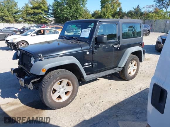 2012 Jeep Wrangler Sport with VIN 1C4GJWAG3CL239118, listed as a IAAI auction lot 43361839 with 89,001 mi miles and . Bid and sale history available at DreamBid. Image 2.