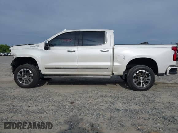2022 Chevrolet Silverado 1500 High Country with VIN 1GCUDJED7NZ589980, listed as a IAAI auction lot 42373577 with 47,292 mi miles and . Bid and sale history available at DreamBid. Image 14.