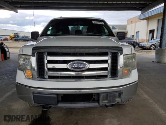2012 Ford F-150 XL с VIN 1FTFX1CT7CFB16539, выставлен на аукционе Copart как лот 82509835 с пробегом 195 563 миль миль и Списание • Salvage title. История ставок и продаж доступна на DreamBid. Изображение 5.