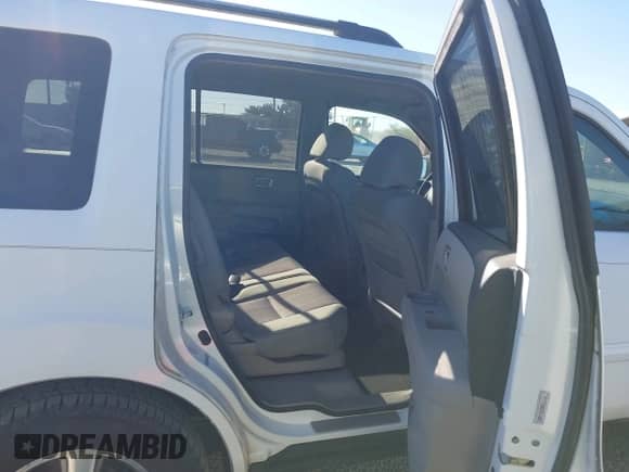 2009 Honda Pilot EX with VIN 5FNYF48439B010116, listed as a IAAI auction lot 43328991 with 184,430 mi miles and . Bid and sale history available at DreamBid. Image 8.