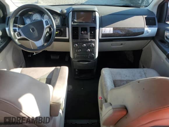 2010 Dodge Grand Caravan SXT with VIN 2D4RN5DX8AR128638, listed as a Copart auction lot 71561915 with 95,925 mi miles and Salvage title. Bid and sale history available at DreamBid. Image 8.