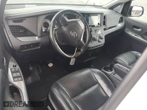 2015 Toyota Sienna SE with VIN 5TDXK3DC4FS663754, listed as a Copart auction lot 65745835 with 100,446 mi miles and Salvage title. Bid and sale history available at DreamBid. Image 8.