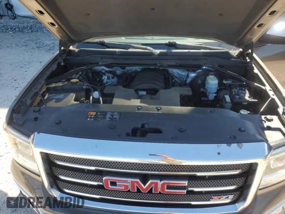 2014 GMC Sierra 1500 SLT z VIN 3GTP1VEC1EG132876, wystawiony jako Copart lot #83957005 z przebiegiem Nie podano mil oraz Szkoda całkowita • Salvage title. Historia ofert i sprzedaży dostępna na DreamBid. Obrazek 11.