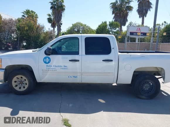 2012 Chevrolet Silverado 1500 LS z VIN 3GCPCREA5CG195542, wystawiony jako IAAI lot #42394304 z przebiegiem 246 628 mil mil oraz . Historia ofert i sprzedaży dostępna na DreamBid. Obrazek 15.
