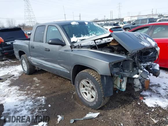 2005 Dodge Dakota с VIN 1D7HE58K75S130091, выставлен на аукционе IAAI как лот 41616904 с пробегом 157 452 миль миль и . История ставок и продаж доступна на DreamBid. Изображение 1.