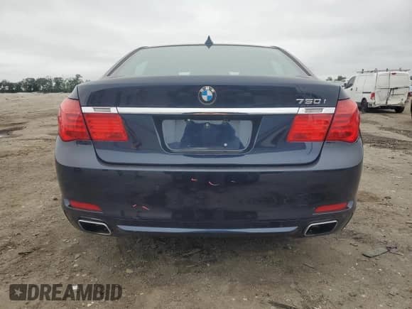 2012 BMW 7 Series 750i xDrive with VIN WBAKC6C52CDX99493, listed as a Copart auction lot 69933035 with 117,809 mi miles and Salvage title. Bid and sale history available at DreamBid. Image 6.