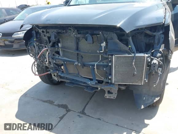 2022 Toyota Tundra SR with VIN 5TFKB5AB7NX017988, listed as a IAAI auction lot 42986871 with 50,437 mi miles and . Bid and sale history available at DreamBid. Image 6.