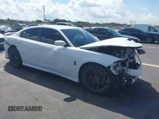 2020 Dodge Charger Scat Pack with VIN 2C3CDXGJ8LH127205, listed as a IAAI auction lot 43234717 with 63,867 mi miles and . Bid and sale history available at DreamBid. Image 1.