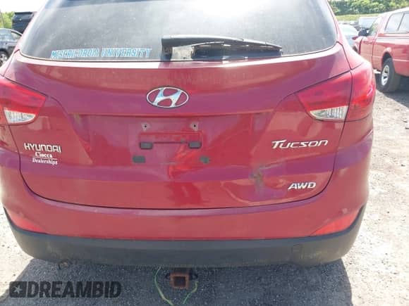 2011 Hyundai Tucson Limited z VIN KM8JUCAC0BU212326, wystawiony jako IAAI lot #42310367 z przebiegiem 154 896 mil mil oraz . Historia ofert i sprzedaży dostępna na DreamBid. Obrazek 6.