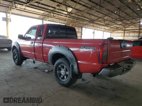 2002 Nissan Frontier XE with VIN 1N6ED26T52C341691, listed as a Copart auction lot 52446055 with 271,761 mi miles and Salvage title. Bid and sale history available at DreamBid. Image 2.