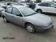 1999 Saturn SL with VIN 1G8ZH5286XZ266266, listed as a Copart auction lot 52543495 with 220,622 mi miles and Salvage title. Bid and sale history available at DreamBid. Image 4.