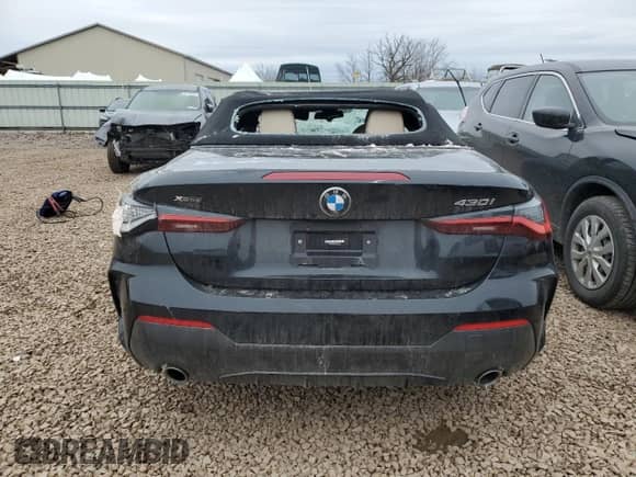 2023 BMW 4 Series 430i xDrive with VIN WBA43AT08PCM90476, listed as a Copart auction lot 50727785 with 11,677 mi miles and Salvage title. Bid and sale history available at DreamBid. Image 6.