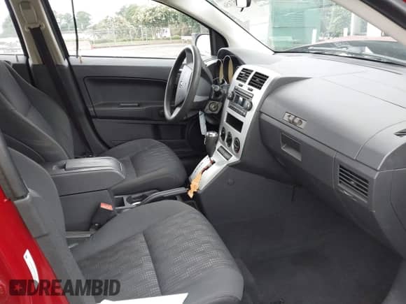2008 Dodge Caliber SE with VIN 1B3HB28B18D561909, listed as a IAAI auction lot 42957456 with 167,709 mi miles and . Bid and sale history available at DreamBid. Image 5.