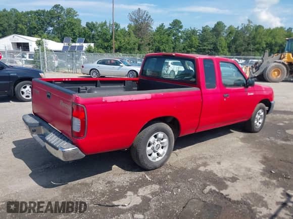 1999 Nissan Frontier XE with VIN 1N6DD26S9XC322264, listed as a IAAI auction lot 42867874 with 230,481 mi miles and . Bid and sale history available at DreamBid. Image 4.