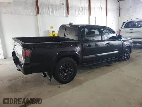 2022 Toyota Tacoma Limited с VIN 3TMGZ5AN7NM512841, выставлен на аукционе Copart как лот 55468955 с пробегом 16 413 миль миль и Списание • Salvage title. История ставок и продаж доступна на DreamBid. Изображение 3.