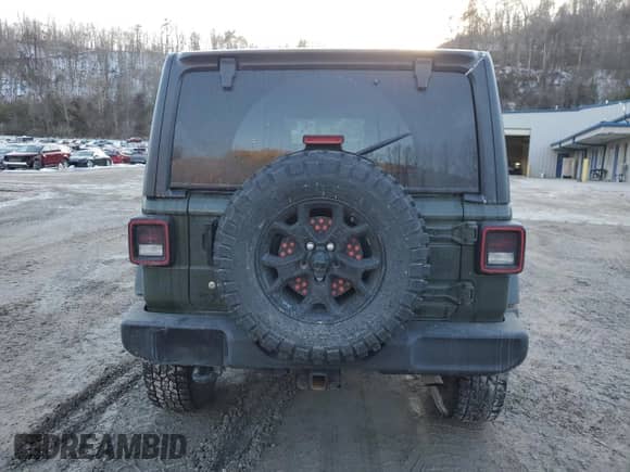 2021 Jeep Wrangler Unlimited Willys Sport with VIN 1C4HJXDG1MW737422, listed as a Copart auction lot 42213845 with 77,363 mi miles and Salvage title. Bid and sale history available at DreamBid. Image 6.