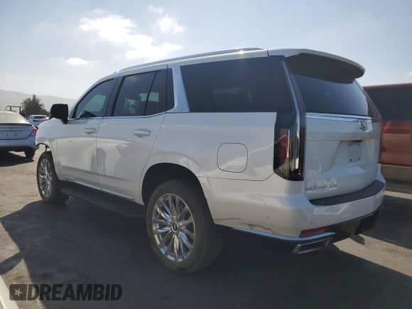 2023 Cadillac Escalade 4WD Premium Luxury с VIN 1GYS4BKL9PR479387, выставлен на аукционе Copart как лот 69058495 с пробегом 85 526 миль миль и Списание • Salvage title. История ставок и продаж доступна на DreamBid. Изображение 2.