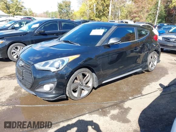 2013 Hyundai Veloster Turbo с VIN KMHTC6AE8DU156928, выставлен на аукционе IAAI как лот 43471857 с пробегом 103 265 миль миль и . История ставок и продаж доступна на DreamBid. Изображение 2.