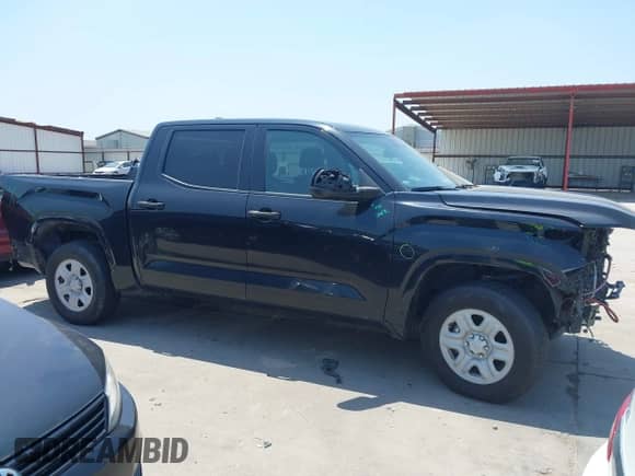 2022 Toyota Tundra SR with VIN 5TFKB5AB7NX017988, listed as a IAAI auction lot 42986871 with 50,437 mi miles and . Bid and sale history available at DreamBid. Image 13.
