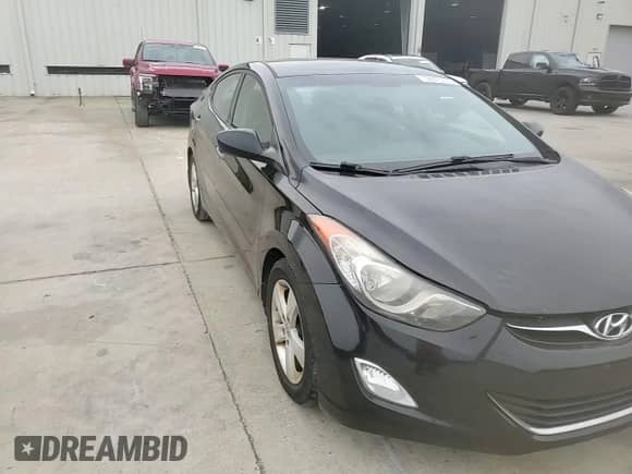 2013 Hyundai Elantra GLS z VIN KMHDH4AE0DU628551, wystawiony jako Copart lot #59375705 z przebiegiem 120 722 mil mil oraz Szkoda całkowita • Salvage title. Historia ofert i sprzedaży dostępna na DreamBid. Obrazek 13.