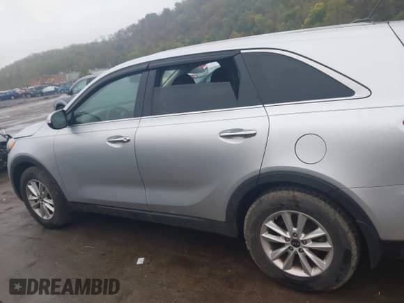 2019 Kia Sorento L with VIN 5XYPG4A34KG569263, listed as a IAAI auction lot 43390806 with 116,537 mi miles and . Bid and sale history available at DreamBid. Image 14.