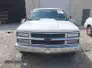 1999 Chevrolet Suburban with VIN 3GNEC16R2XG127337, listed as a IAAI auction lot 42061752 with 210,723 mi miles and . Bid and sale history available at DreamBid. Image 6.
