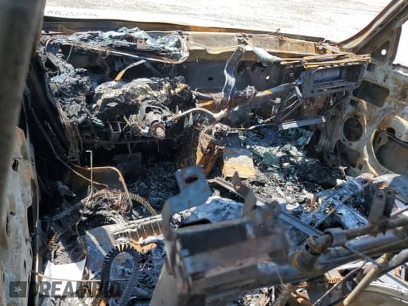 2002 Chevrolet Suburban LT z VIN 3GNGK26G12G301147, wystawiony jako Copart lot #65392395 z przebiegiem Nie podano mil oraz Szkoda całkowita • Salvage title. Historia ofert i sprzedaży dostępna na DreamBid. Obrazek 8.