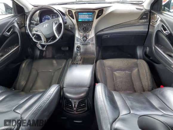 2013 Hyundai Azera с VIN KMHFH4JG7DA199128, выставлен на аукционе Copart как лот 81682065 с пробегом 130 029 миль миль и Чистый • Clean title. История ставок и продаж доступна на DreamBid. Изображение 8.