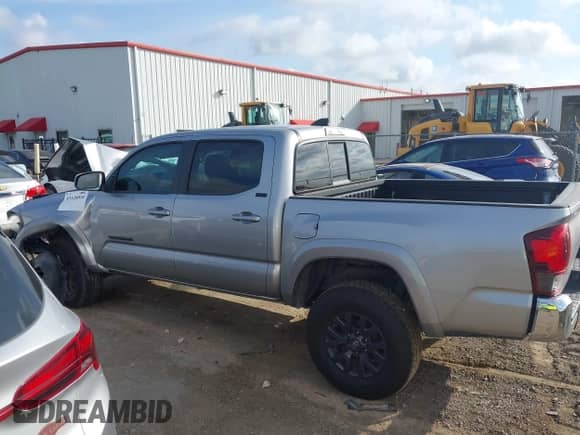2021 Toyota Tacoma SR with VIN 5TFAX5GN3MX188850, listed as a IAAI auction lot 43128910 with 67,247 mi miles and . Bid and sale history available at DreamBid. Image 14.