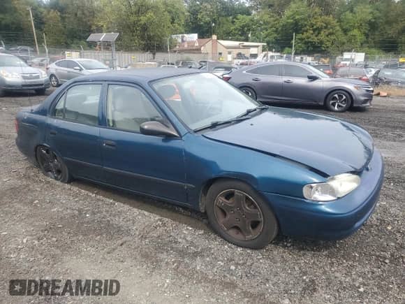 1999 Chevrolet Prizm с VIN 1Y1SK5284XZ409543, выставлен на аукционе Copart как лот 84379805 с пробегом Не указан миль и Списание • Salvage title. История ставок и продаж доступна на DreamBid. Изображение 4.