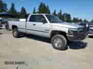 1999 Dodge 2500 with VIN 1B7KF2362XJ531322, listed as a Copart auction lot 80100015 with 222,772 mi miles and Salvage title. Bid and sale history available at DreamBid. Image 4.