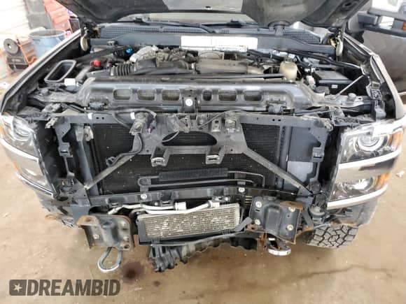 2018 Chevrolet Silverado 2500HD High Country с VIN 1GC1KXEY0JF157645, выставлен на аукционе Copart как лот 68149185 с пробегом 124 791 миль миль и Списание • Salvage title. История ставок и продаж доступна на DreamBid. Изображение 11.