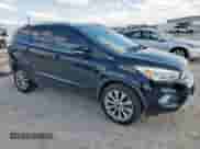 2017 Ford Escape Titanium with VIN 1FMCU0JDXHUE46871, listed as a Copart auction lot 84042315 with 89,103 mi miles and Salvage title. Bid and sale history available at DreamBid. Image 4.