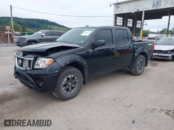 2019 Nissan Frontier SV with VIN 1N6AD0EV9KN726472, listed as a IAAI auction lot 42868991 with 57,325 mi miles and . Bid and sale history available at DreamBid. Image 2.