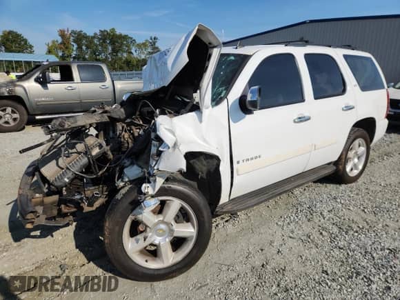 2008 Chevrolet Tahoe LTZ с VIN 1GNFC13078R163293, выставлен на аукционе Copart как лот 80201545 с пробегом 228 289 миль миль и Списание • Salvage title. История ставок и продаж доступна на DreamBid. Изображение 1.