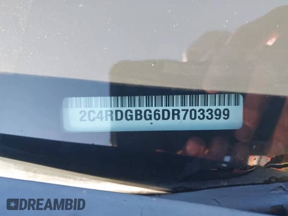 2013 Dodge Grand Caravan SE with VIN 2C4RDGBG6DR703399, listed as a IAAI auction lot 43230305 with 113,048 mi miles and . Bid and sale history available at DreamBid. Image 9.