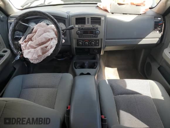 2007 Dodge Dakota SLT с VIN 1D7HW48P87S187504, выставлен на аукционе Copart как лот 71025285 с пробегом 199 133 миль миль и Списание • Salvage title. История ставок и продаж доступна на DreamBid. Изображение 8.
