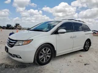 2016 Honda Odyssey Touring Elite с VIN 5FNRL5H98GB127413, выставлен на аукционе Copart как лот 62786945 с пробегом 176 675 миль миль и Чистый • Clean title. История ставок и продаж доступна на DreamBid. Изображение 1.