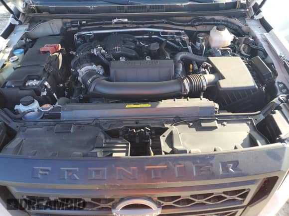 2024 Nissan Frontier SV with VIN 1N6ED1EK1RN671183, listed as a Copart auction lot 84103934 with 5,523 mi miles and Salvage title. Bid and sale history available at DreamBid. Image 11.