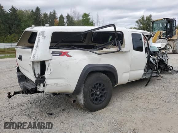 2022 Toyota Tacoma SR z VIN 3TYRZ5CN1NT014189, wystawiony jako Copart lot #81127735 z przebiegiem Nie podano mil oraz Szkoda całkowita • Salvage title. Historia ofert i sprzedaży dostępna na DreamBid. Obrazek 3.